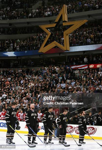Loui Eriksson, Mattias Norstrom, Joel Lundqvist, Stephane Robidas and Toby Petersen of the Dallas Stars stand for the singing of the national anthem...