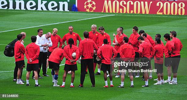 Carlos Queiroz, the Manchester United assistant manager speaks to the squad during the Manchester United training session ahead of the Champions...