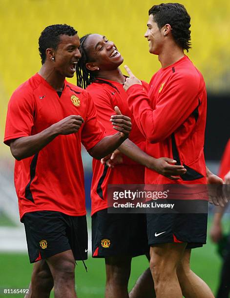 Cristiano Ronaldo shares a joke with teammates, Anderson and Nani during the Manchester United training session ahead of the Champions League Final...