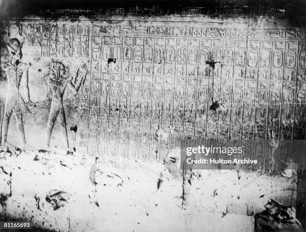 The Abydos King List or Abydos Table on the walls of the Temple of Seti I at Abydos, Egypt, circa 1930. On the list are the names of seventy-six...