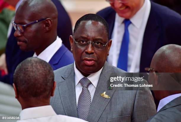 Senegal President Macky Sall arrives for the morning working session on the second day of the G20 economic summit on July 8, 2017 in Hamburg,...