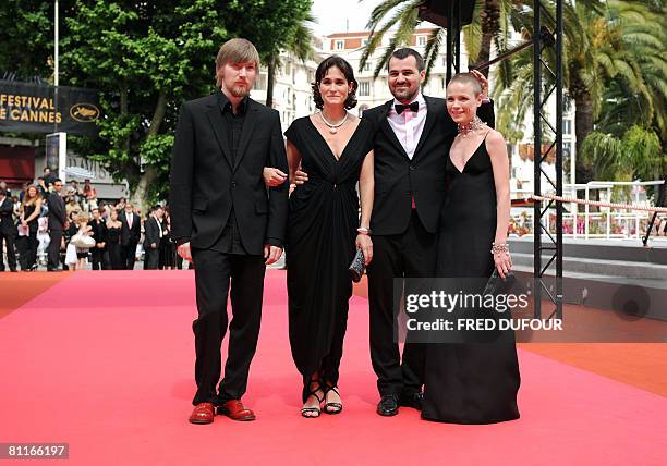 Hungarian actors Felix Lajko and Lili Monori, director Kornel Mindruczo and actress Orsi Toth pose as they arrive for the screening of their film...