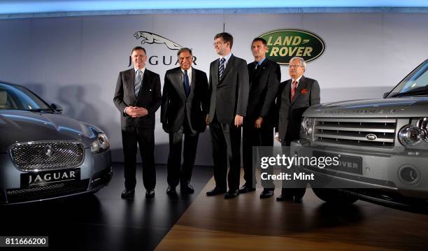 Mike O'Driskoll, Managing Director of Jaguar; David Smith, CEO of Land Rover; Phil Popham, Managing Director of Land Rover; Ratan Tata, Chairman of...