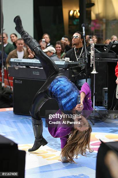 Singer Fergie does a cartwheel while singing her version of Heart's "Barracuda" on NBC's "The Today Show," Dean & Deluca Plaza, Rockerfeller Plaza,...