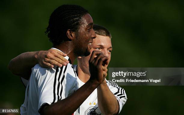 Richard Sukuta-Pasu of Germany celebrates scoring the first goal with Fabian Baecker during the Men's U18 international friendly match between...