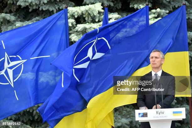 Secretary General Jens Stoltenberg stands during a press conference with Ukrainian President in Kiev on July 10, 2017. ?NATO chief Jens Stoltenberg...
