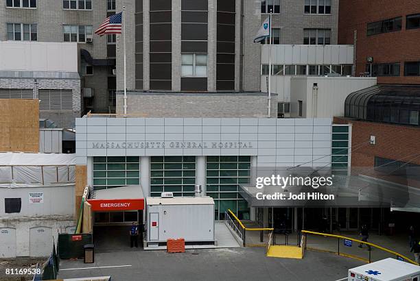 Person stands at an emergency entrance to Massachusetts General Hospital where US Sen. Edward Kennedy is being treated May 20, 2008 in Boston,...