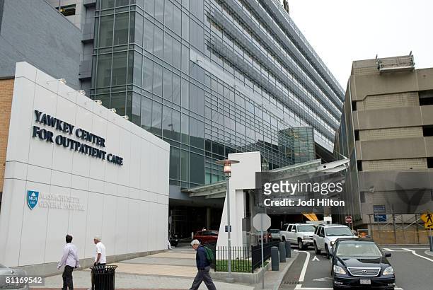 People walk past an entrance to Massachusetts General Hospital where US Sen. Edward Kennedy is being treated May 20, 2008 in Boston, Massachusetts....