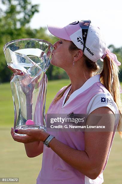 Paula Creamer kisses the trophy after defeating Juli Inkster in a playoff at the SemGroup Championship presented by John Q. Hammons on May 4, 2008 at...