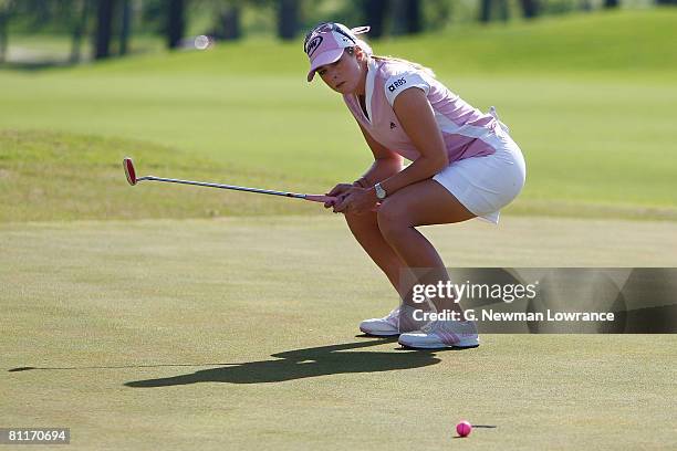 Paula Creamer reacts after missing a putt to win on the 18th hole during the final round of the SemGroup Championship presented by John Q. Hammons on...