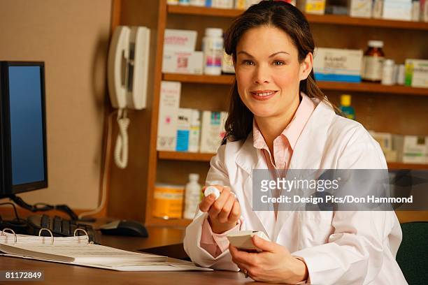 portrait of a pharmacist - design pics don hammond stock-fotos und bilder