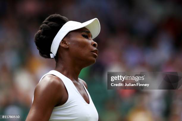 Venus Williams of The United States reacts during the Ladies Singles fourth round match against Ana Konjuh of Croatia on day seven of the Wimbledon...