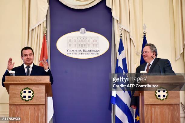 Serbia's Foreign Minister Ivica Dacic speaks during a press conference with his Greek counterpart, Nikos Kotzias on July 10, 2017 in Athens. / AFP...