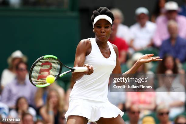 Venus Williams of The United States plays a forehand during the Ladies Singles fourth round match against Ana Konjuh of Croatia on day seven of the...