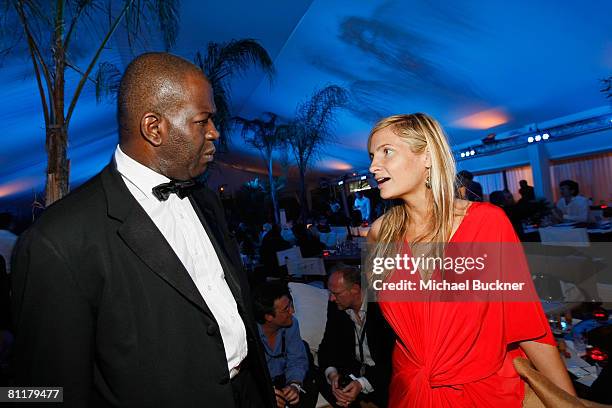 Baz Bamigboye and Holly Wiersma attend the Roman Polanski "Wanted and Desired" after party at Nikki Beach during the 61st Cannes International Film...