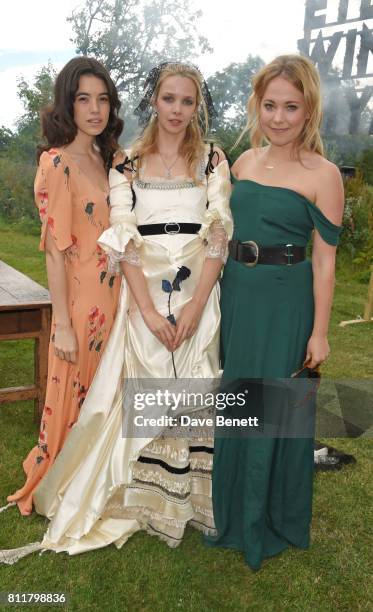 Gala Gordon, Greta Bellamacina and Poppy Jamie attend Greta Bellamacina and Robert Montgomery's wedding on July 8, 2017 in Exeter, England.