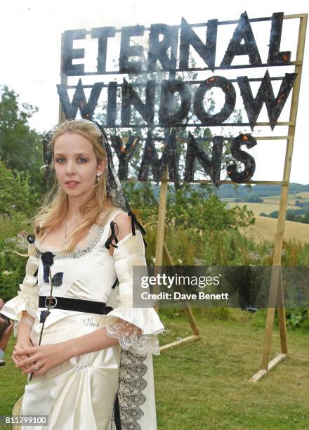 Greta Bellamacina poses at her wedding to Robert Montgomery on July 8, 2017 in Exeter, England.