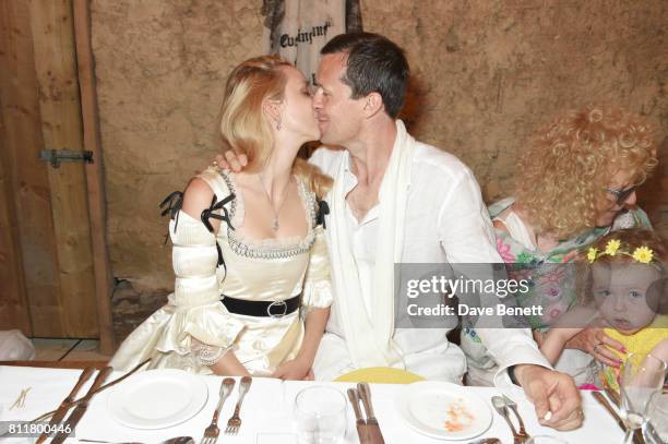 Greta Bellamacina and Robert Montgomery kiss at their wedding on July 8, 2017 in Exeter, England.