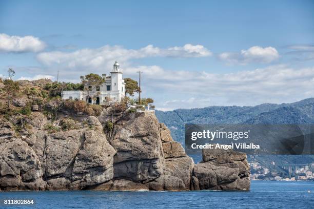 faro di punta di portofino - portofino fotografías e imágenes de stock