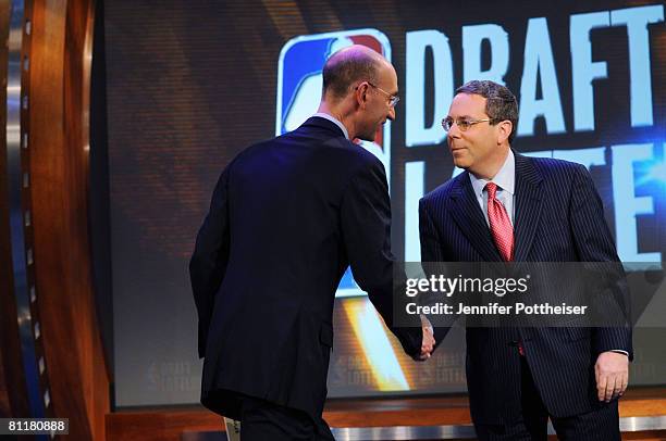 Deputy Commissioner Adam Silver congratulates Steve Schanwald, Executive Vice President of Baketball Operations of the Chicago Bulls during the 2008...