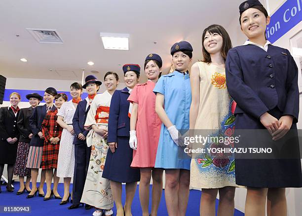 College student models dispay British Airways' cabin attendant uniforms from 1946 to current the models, including paper made dress and kimono dress...