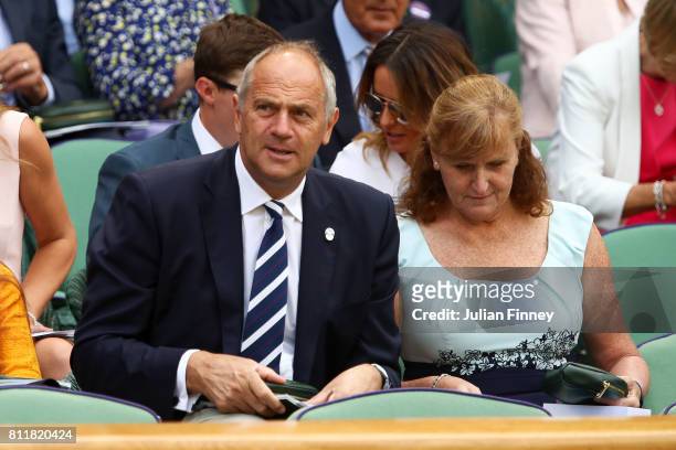 Sir Steve Redgrave and Lady Ann Redgrave look on from the centre court royal box on day seven of the Wimbledon Lawn Tennis Championships at the All...