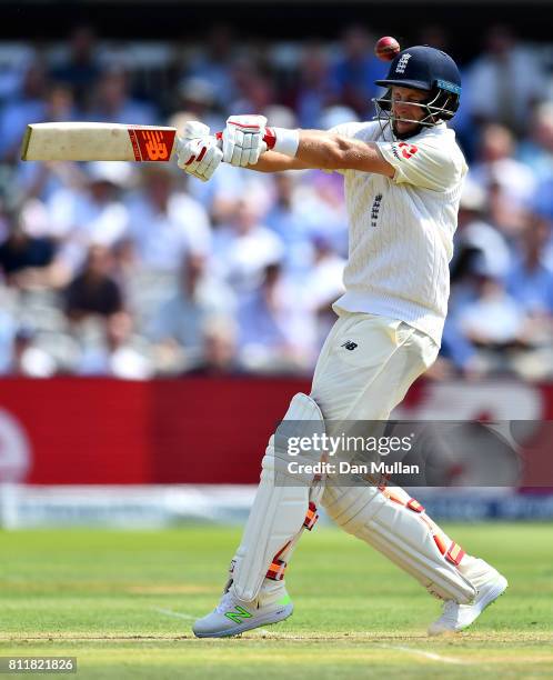 Joe Root of England is hit on the helmet during day one of the 1st Investec Test Match between England and South Africa at Lord's Cricket Ground on...