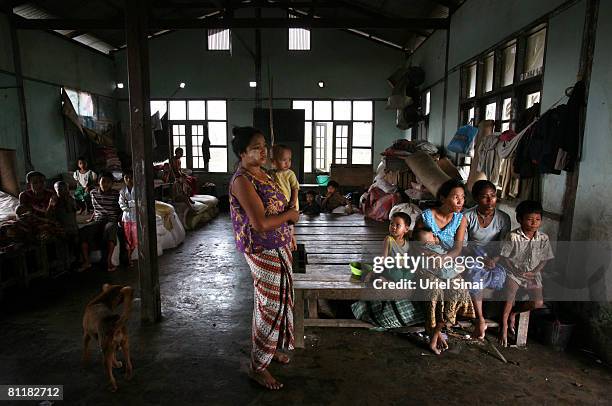 Homeless people find shelter in a school at the isolated village of Myasein Kan on May 20, 2008 in the Ayeyarwaddy delta, Myanmar. It has been...