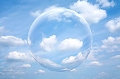 Sphere in the blue sky with white cloud