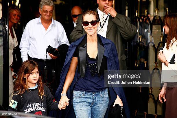 Celine Dion and her son Rene-Charles leave the Four Seasons George V hotel on May 20, 2008 in Paris, France.