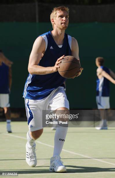 Per Mertesacker of Germany plays basketball at the Arabella Sheraton Son Vida team squad on May 20, 2008 in Mallorca, Spain.