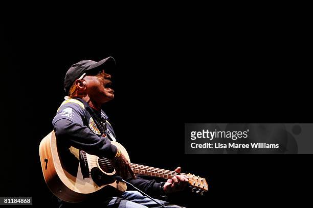 Australian Indigenous singer Archie Roach performs on stage during a preview of his new documentary film Liyarn Ngarn at the Sydney Writers Festival...