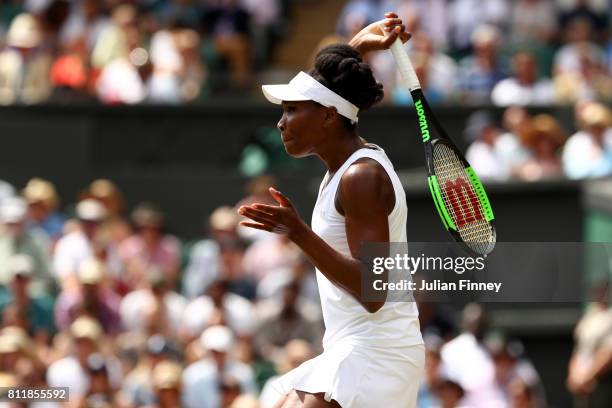 Venus Williams of The United States plays a forehand during the Ladies Singles fourth round match against Ana Konjuh of Croatia on day seven of the...