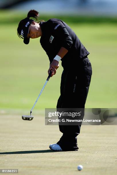 Mi Hyun Kim of Korea putts during the second round of the SemGroup Championship presented by John Q. Hammons on May 2, 2008 at Cedar Ridge Country...