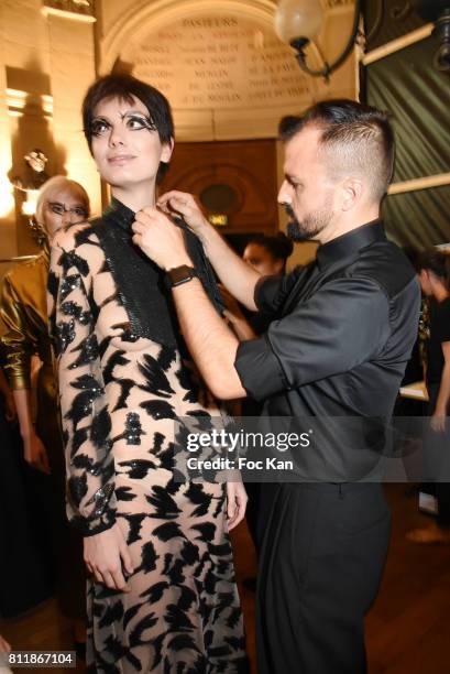 Designer Julien Fournie and a model attend the Julien Fournie Haute Couture Fall/Winter 2017-2018 show as part of Haute Couture Paris Fashion Week on...