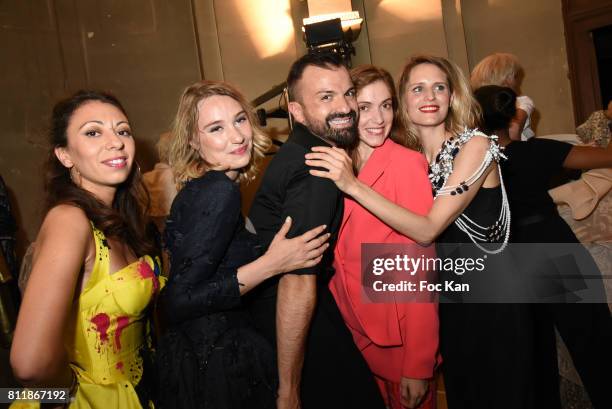 Gayanee Pierre, actress Deborah Francois, designer Julien Fournie, actresses Maud Wyler and Sabrina Seyvecou attend the Julien Fournie Haute Couture...