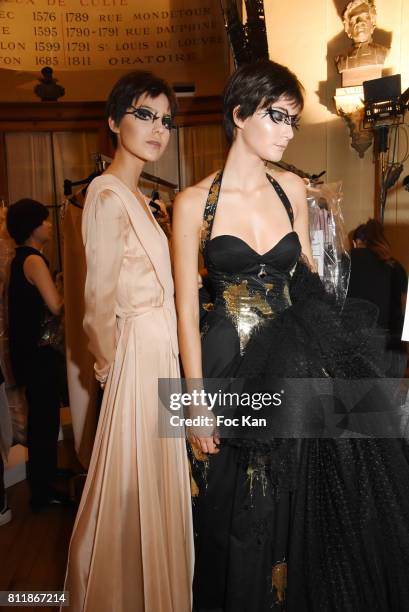 Models dressed by Julien Fournie attend the Julien Fournie Haute Couture Fall/Winter 2017-2018 show as part of Haute Couture Paris Fashion Week on...