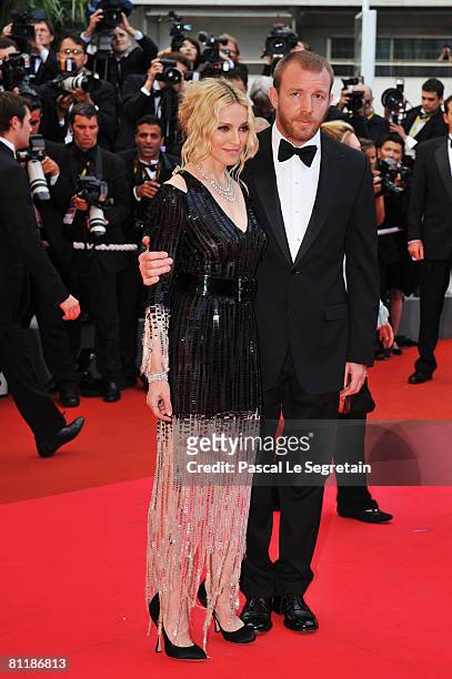 Madonna and husband and director Guy Ritchie arrive at the 'I Am Because We Are' Premiere at the Palais des Festivals during the 61st International...