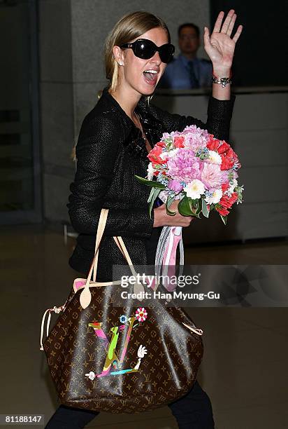 Designer and socialite Nicky Hilton arrives at Incheon International Airport on May 21, 2008 in Incheon, South Korea.Hilton arrives in Korea to...