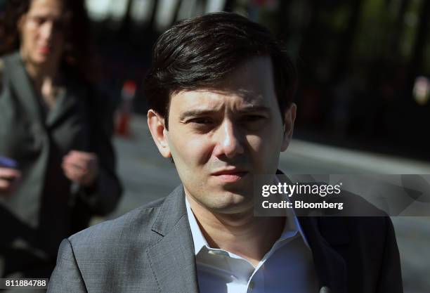 Martin Shkreli, former chief executive officer of Turing Pharmaceuticals AG, arrives at federal court in the Brooklyn borough of New York, U.S., on...