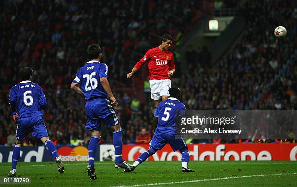 Cristiano Ronaldo of Manchester United heads the opening goal during the UEFA Champions League Final match between Manchester United and Chelsea at...