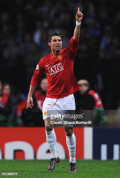 Cristiano Ronaldo of Manchester United celebrates after scoring the opening goal during the UEFA Champions League Final match between Manchester...