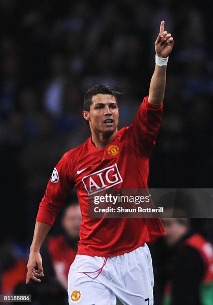 Cristiano Ronaldo of Manchester United celebrates after scoring the opening goal during the UEFA Champions League Final match between Manchester...