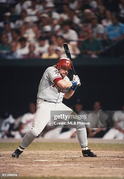 John Kruk of the Philadelphia Phillies on the National League team avoids a pitch in the third innning after Randy Johnson of the Seattle Mariners on...