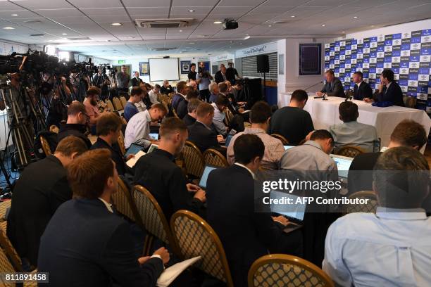 Everton's new signing, English striker Wayne Rooney speaks during a press conference at Goodison Park in Liverpool on July 10 following his move to...