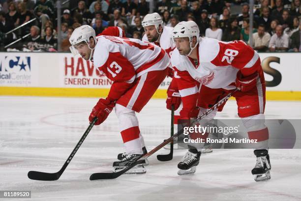 Pavel Datsyuk, Brian Rafalski and Tomas Holmstrom of the Detroit Red Wings get set on a face off against the Dallas Stars during game six of the...