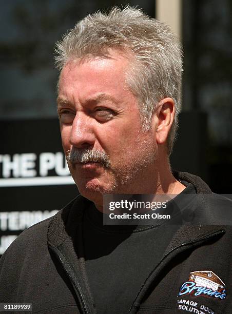 Former Bolllingbrook, Illinois police officer Drew Peterson leaves the Will County Jail after posting bail for a felony weapons charge May 21, 2008...