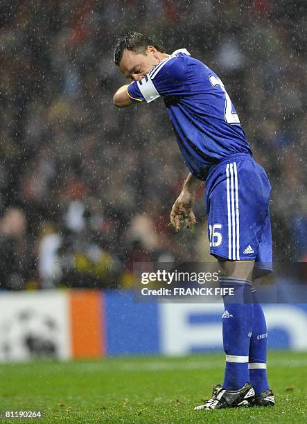 Chelsea's English defender John Terry misses a penalty during a penalty shoot out in the final of the UEFA Champions League football match at the...