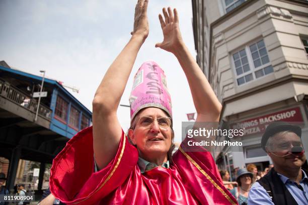 Man in bishop disguise during G 20 summit in Hamburg on July 8, 2017.