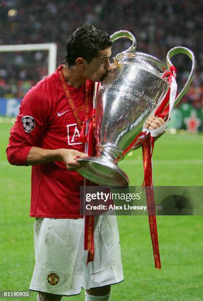 Cristiano Ronaldo of Manchester United kisses the trophy following his team's victory during the UEFA Champions League Final match between Manchester...